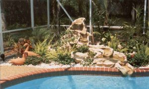 Multipe piece poolside fountain with adjacent planters, Sarasota, FL