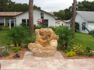 Custom Tranquility fountain with clients shell collection embeded all over fountain, Tampa FL