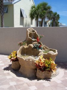 Stotz fountain with three adjacent planters